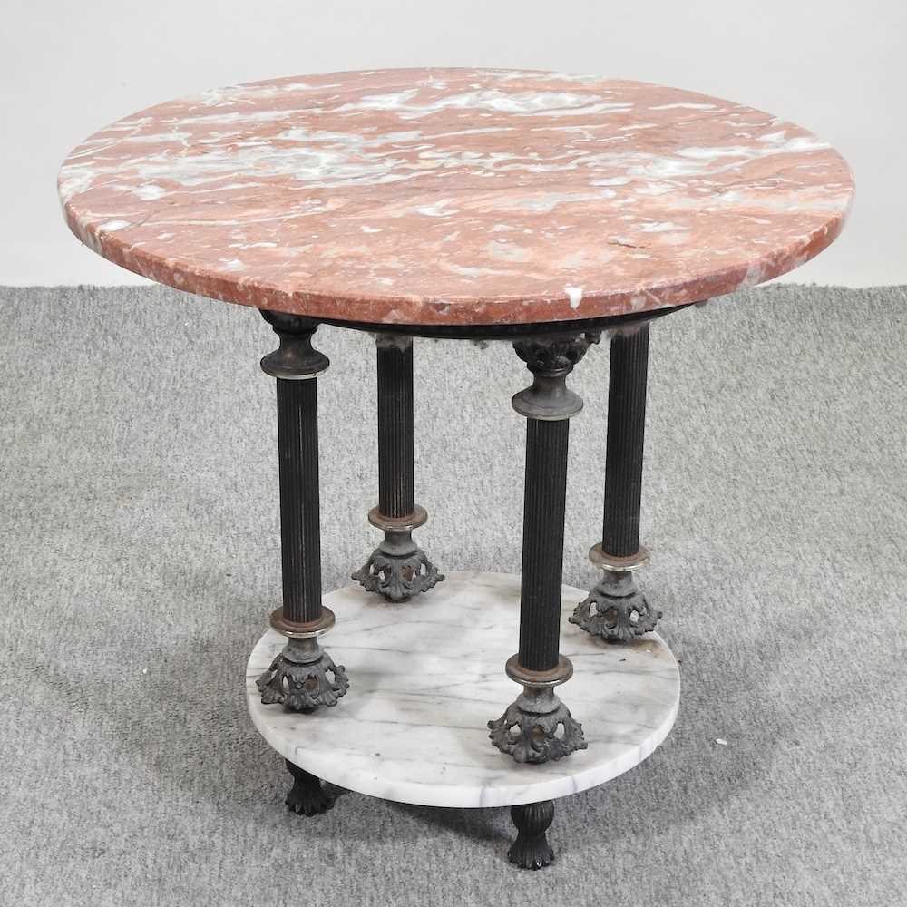 Lot 499 - A circular marble top occasional table