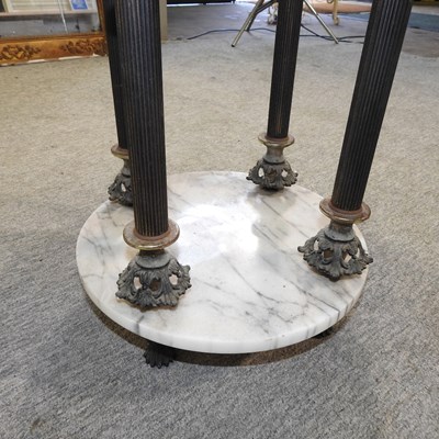 Lot 499 - A circular marble top occasional table