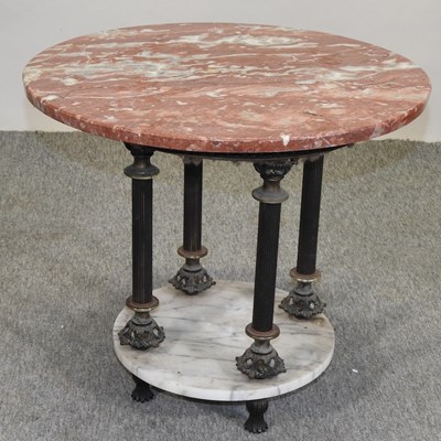 Lot 499 - A circular marble top occasional table