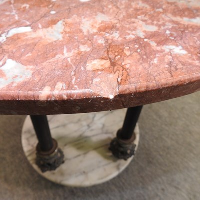 Lot 499 - A circular marble top occasional table