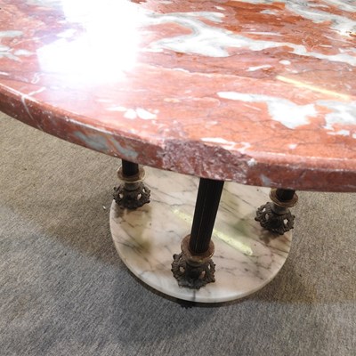 Lot 499 - A circular marble top occasional table