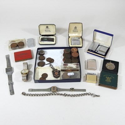 Lot 610 - A collection of coins and lighters