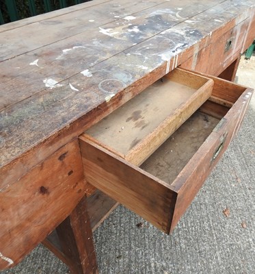 Lot 595 - A workshop workbench