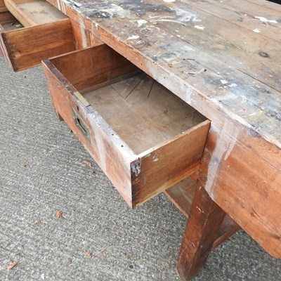 Lot 595 - A workshop workbench