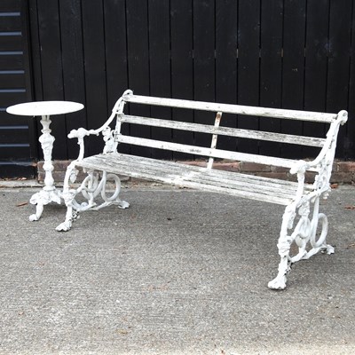 Lot 509 - A garden bench and table