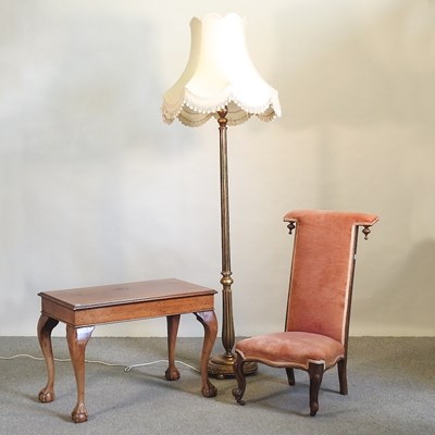 Lot 421 - A chair, lamp and table