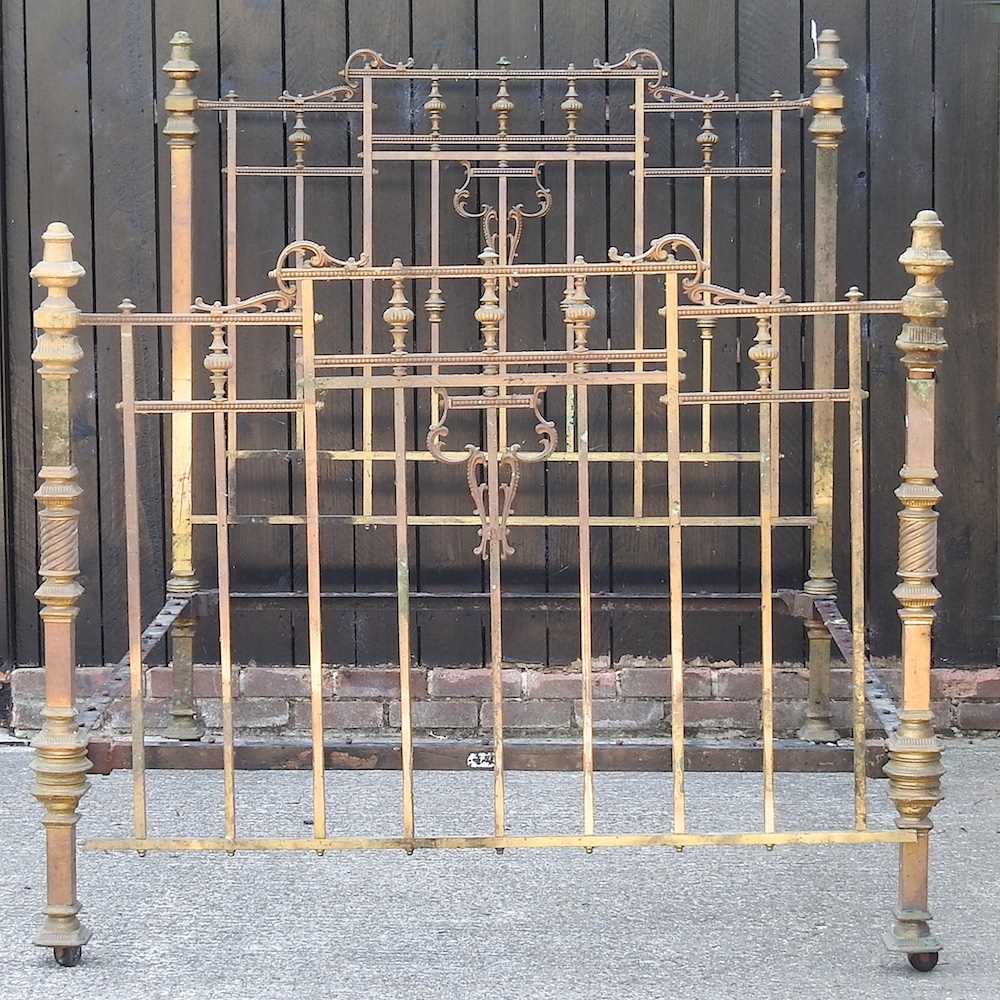 Lot 668 - A brass bedstead