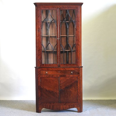 Lot 689 - A George III cabinet