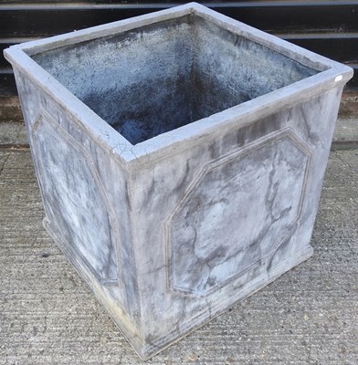 Lot 527 - A fibreglass garden planter