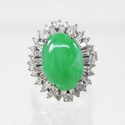 Lot 285 - A jade diamond ring