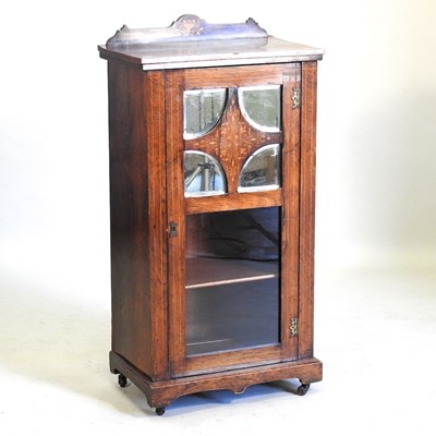 Lot 565 - An Edwardian music cabinet