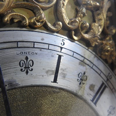 Lot 74 - An Edwardian oak bracket clock