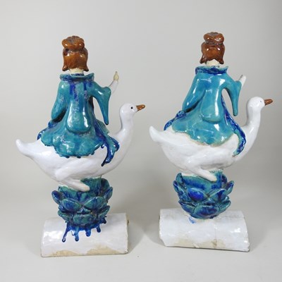 Lot 24 - A pair of glazed roof tiiles