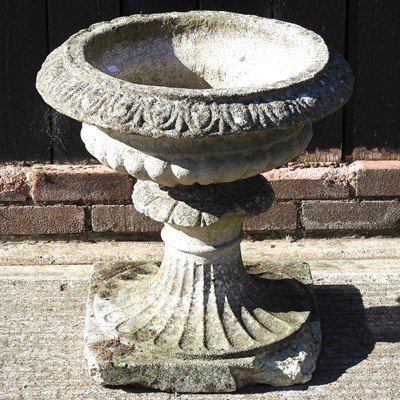 Lot 513 - A cast stone planter