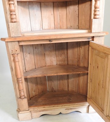 Lot 681 - An antique pine corner cupboard