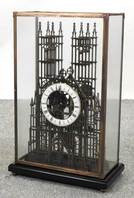 Lot 467 - A brass cathedral skeleton clock