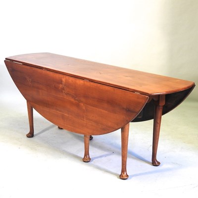 Lot 216 - A fruitwood wakes table