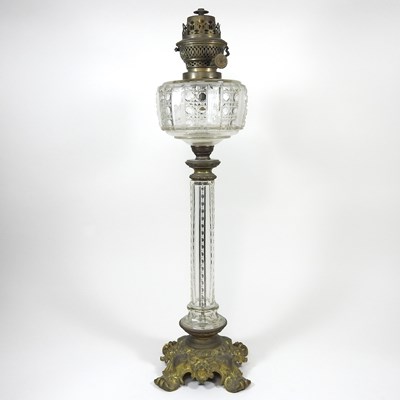 Lot 184 - A glass oil lamp