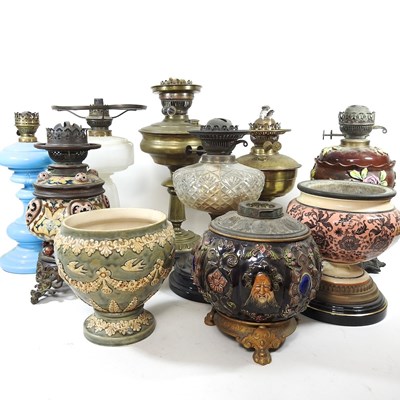 Lot 405 - A collection of oil lamps