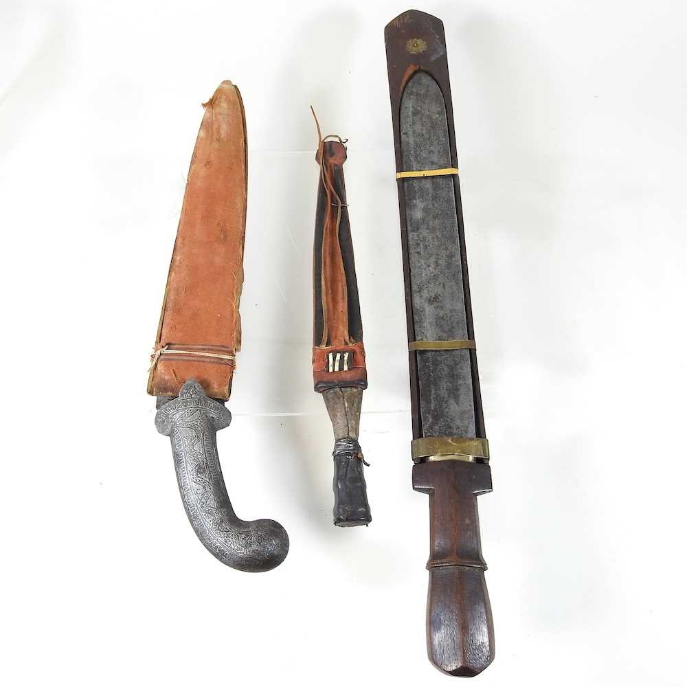 Lot 64 - Three tribal knives