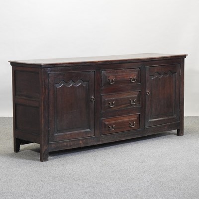 Lot 490 - A 19th century oak sideboard