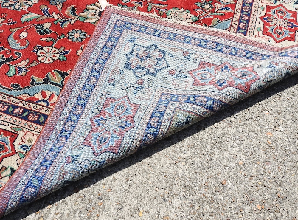 Lot 233 A Persian carpet