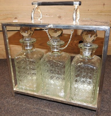 Lot 100 - A silver plated tantalus