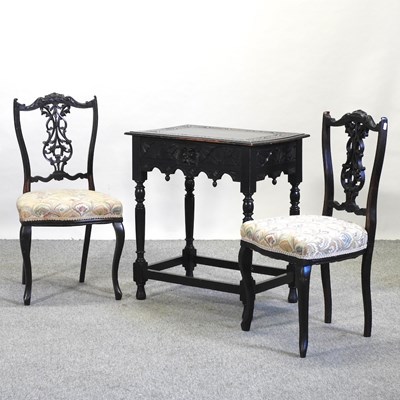 Lot 494 - A Victorian carved dark oak side table