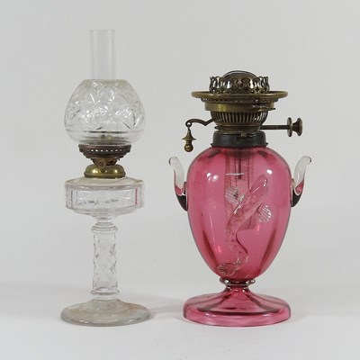 Lot 238 - Two oil lamps