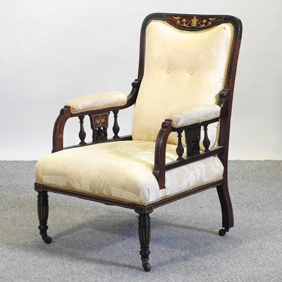 Lot 503 - An Edwardian cream upholstered armchair