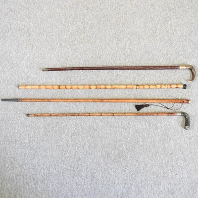 Lot 182 - Four walking sticks