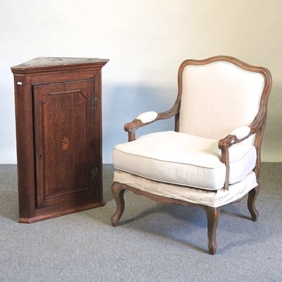 Lot 534 - A French open armchair and cabinet