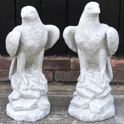 Lot 164 - A pair of cast stone eagles