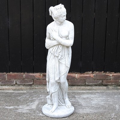 Lot 410 - A cast stone statue