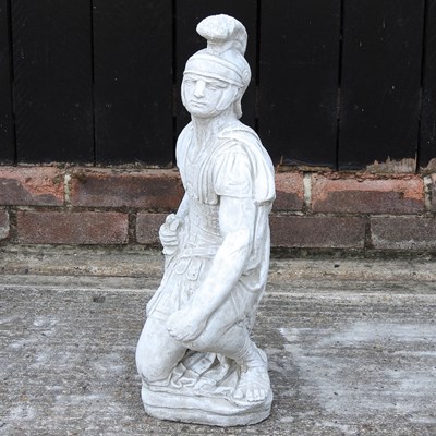 Lot 19 - A cast stone figure