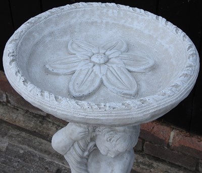 Lot 494 - A cast stone bird bath