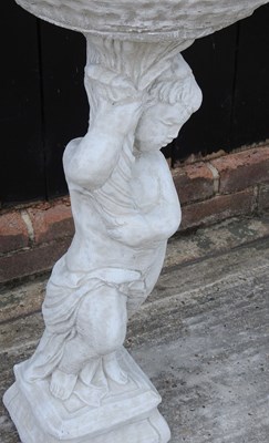 Lot 494 - A cast stone bird bath