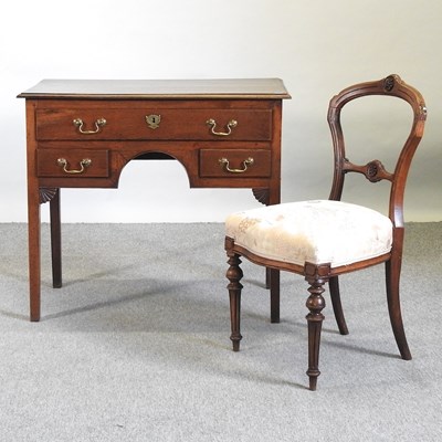 Lot 457 - A lowboy and chair