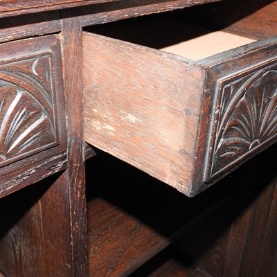 Lot 341 - A carved oak dresser