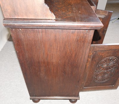 Lot 341 - A carved oak dresser