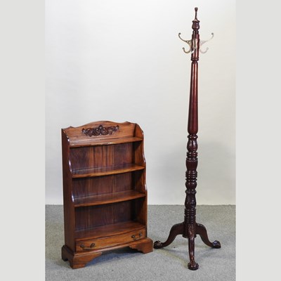 Lot 501 - A modern waterfall dwarf open bookcase