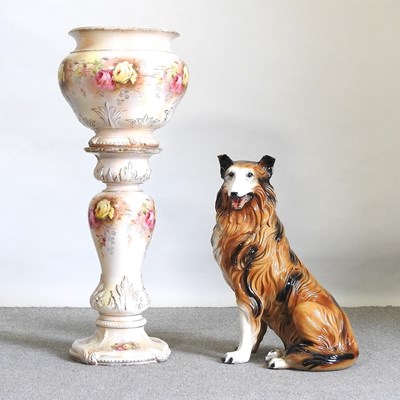 Lot 522 - A pottery dog and jardiniere