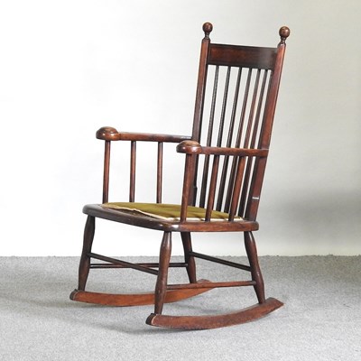 Lot 544 - A rocking chair