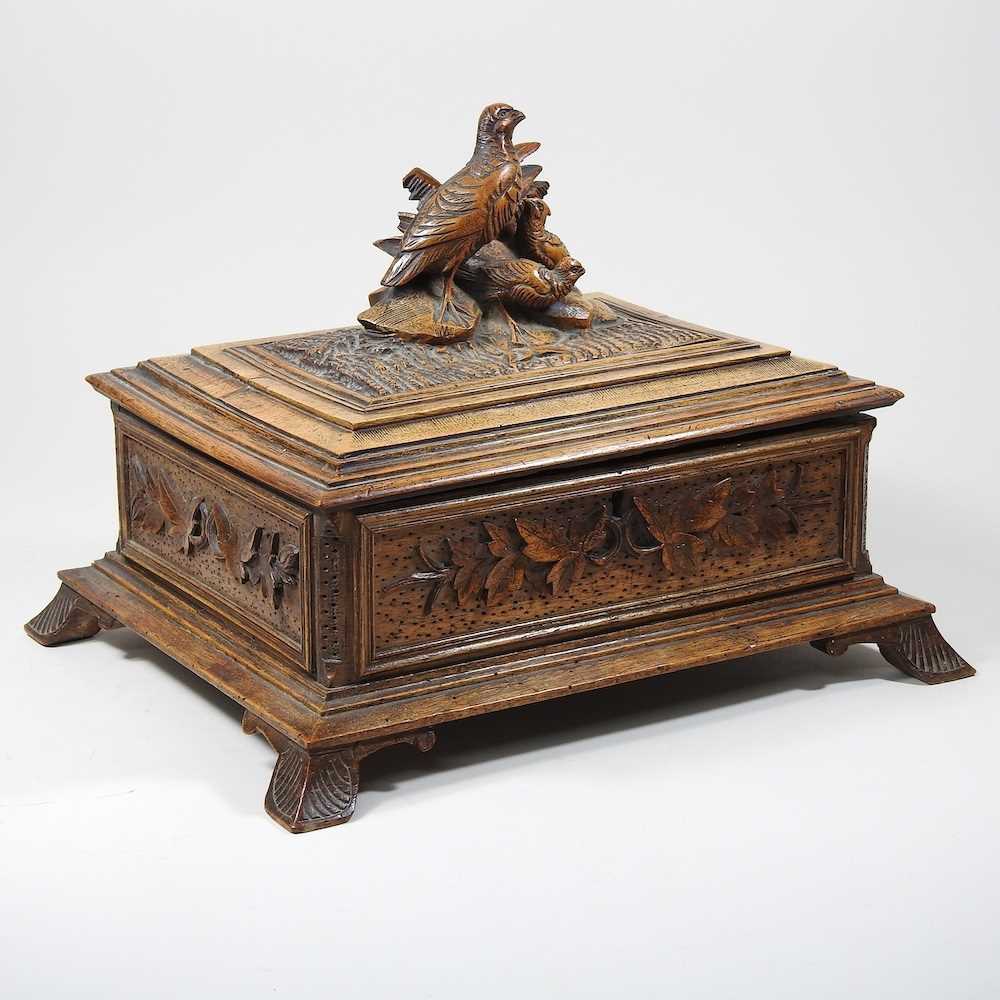 Lot 4 - A carved casket