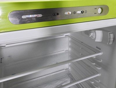 Lot 402 - A SMEG lime green fridge-freezer