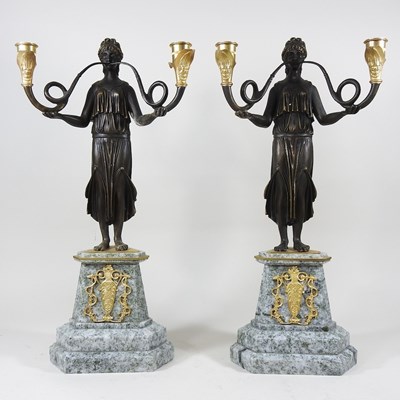 Lot 584 - A pair of candelabra