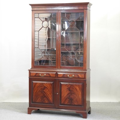 Lot 510 - A late 19th century mahogany cabinet bookcase