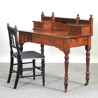 Lot 543 - An Edwardian walnut writing desk