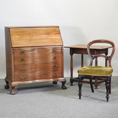 Lot 511 - A mid 20th century hardwood bureau