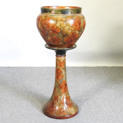 Lot 595 - A Doulton jardiniere on stand